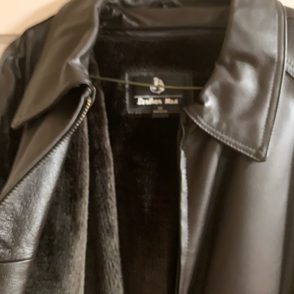 Brown Leather Bomber Jacket w/ brown fur lining. Used in excellent condition.